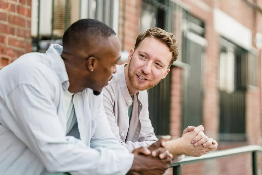 two guys talking about discipleship