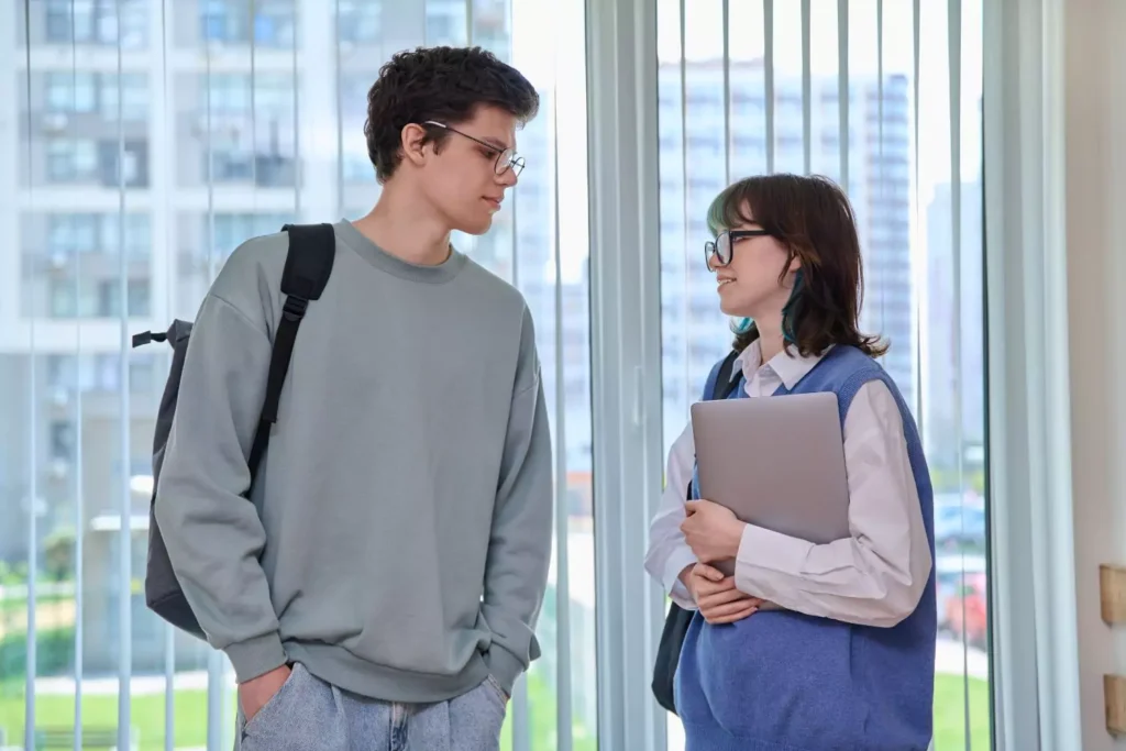 a guy and girl in a friendlationship talking to one another