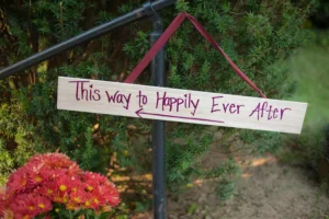 Just married, a sign that says "This way to happily ever after"