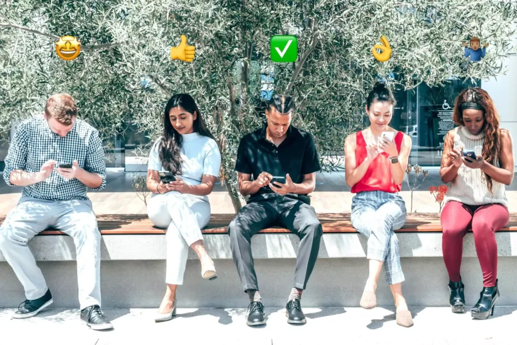 5 people sitting on a bench, scrolling social media